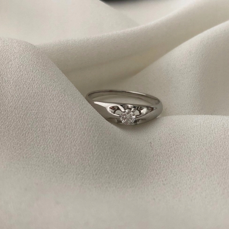 Biele zlato prsteň s diamantom 0,12ct