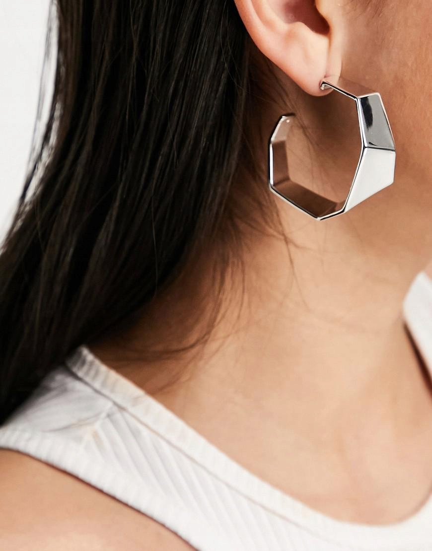R0F64 Calvin Klein Angle RIM RUPS v striebre