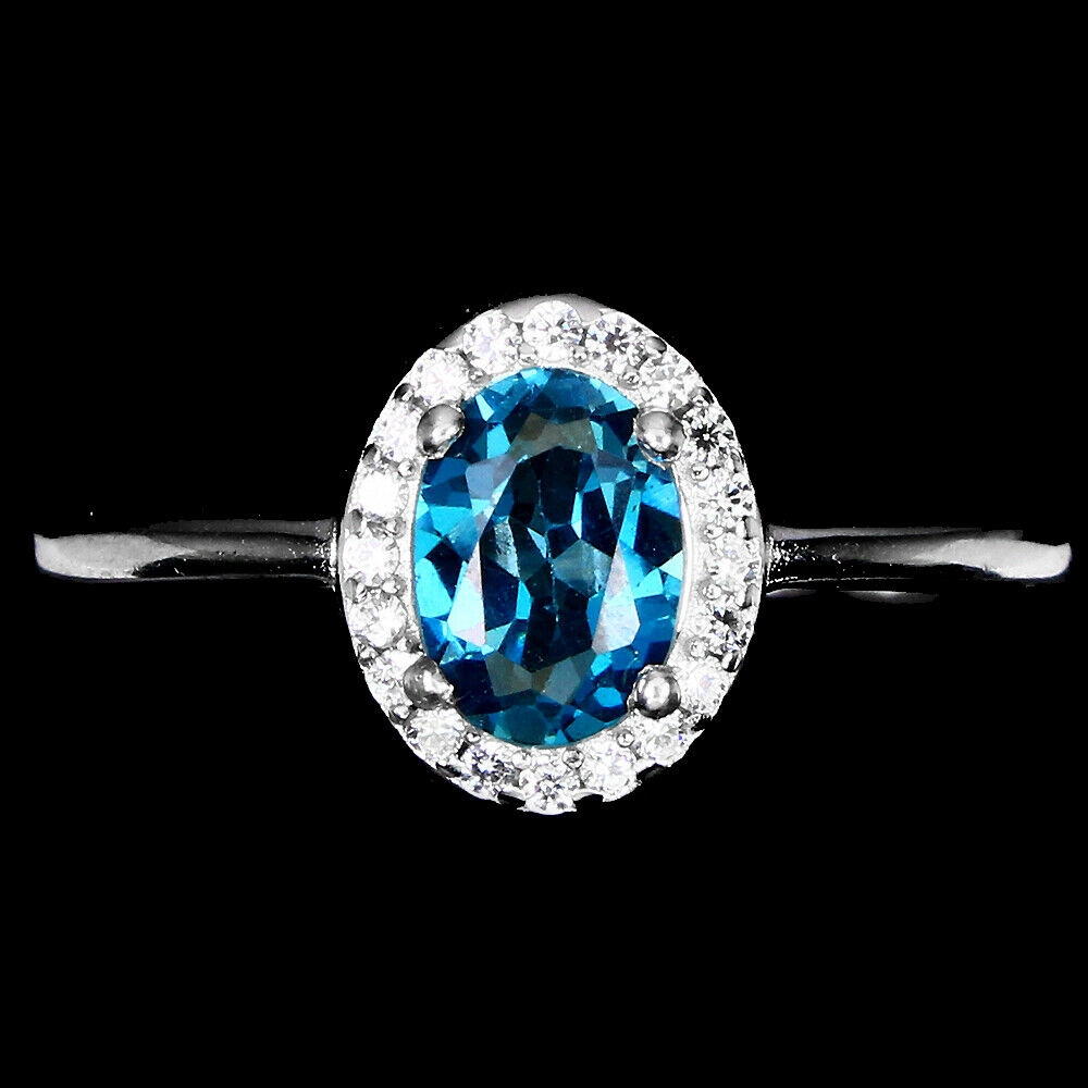 Strieborný prsteň, prírodný topás London Blue, 19